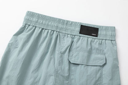AMIRI Starburst logo shell swim shorts