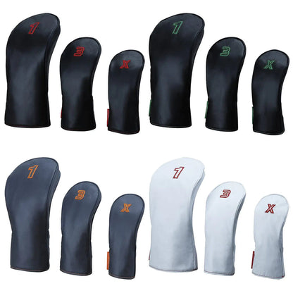 A collection of golf club headcovers in various sizes displays numbers and letters on them The headcovers are arranged in two rows with different color variations and designs for identification