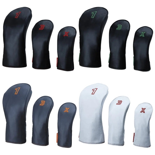 A collection of golf club headcovers in various sizes displays numbers and letters on them The headcovers are arranged in two rows with different color variations and designs for identification