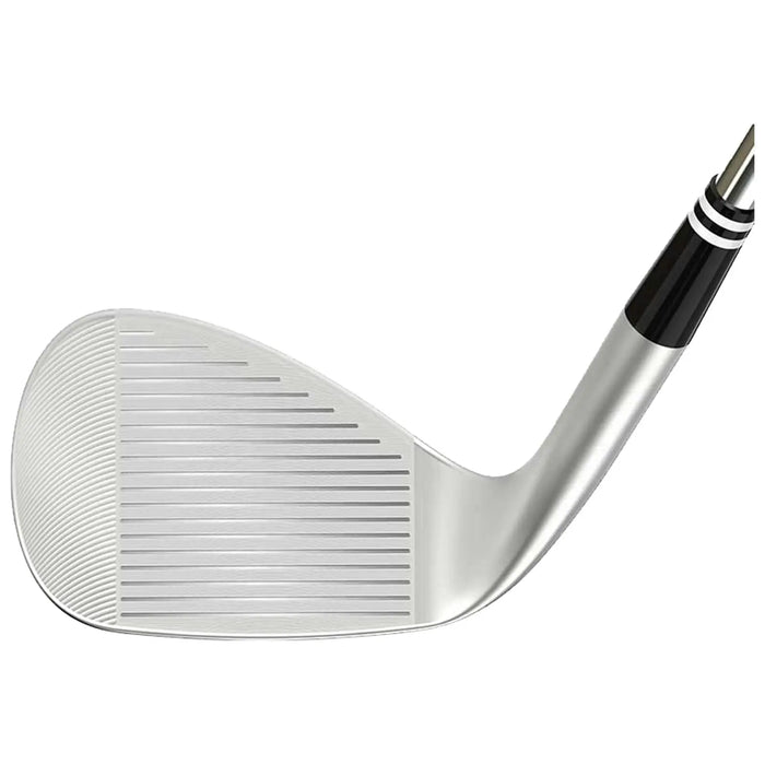 A golf club head with a polished silver face and grooves is positioned at an angle showcasing its design and surface texture against a plain background.