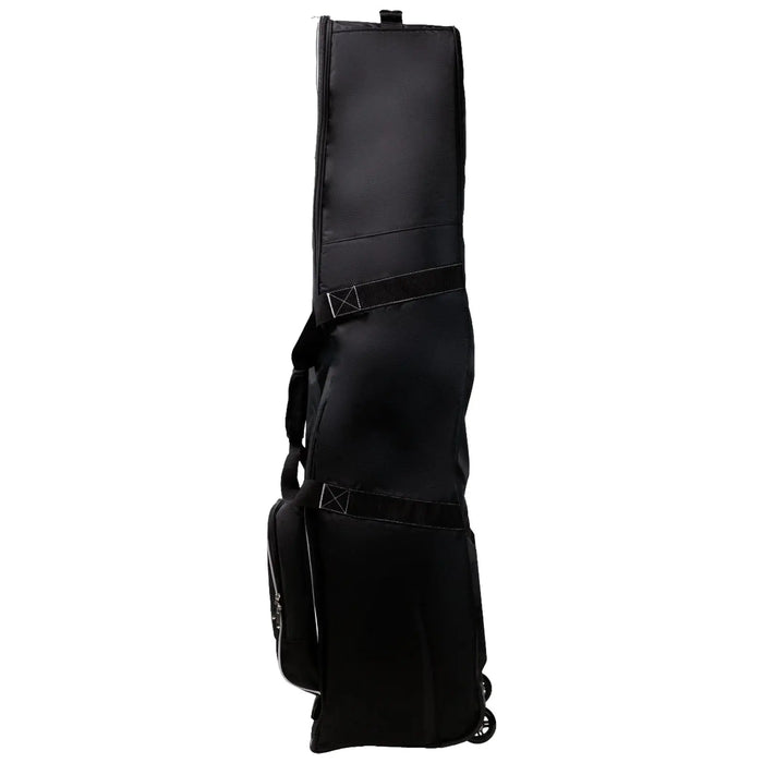 A tall black travel bag stands upright featuring wheels for mobility and multiple compartments for storage providing a practical design for transporting equipment in various settings.