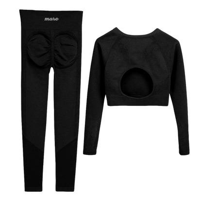 Black long-sleeve top and leggings set with 'mare' branding on a white background