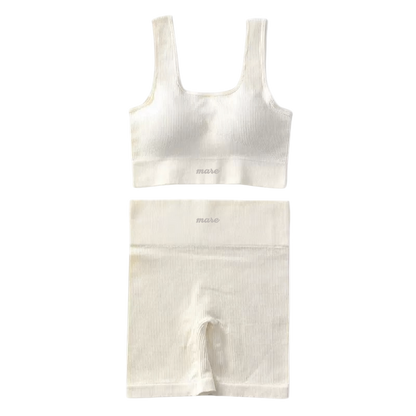 White ribbed tank top and shorts set on a white background