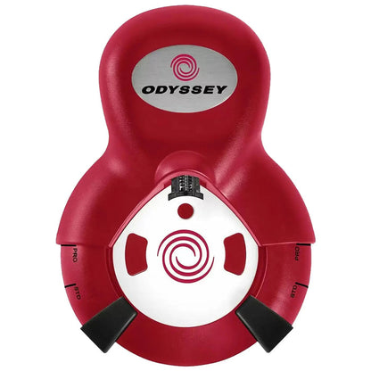 A red golf putting training aid features a circular base with adjustable settings labeled PRO and STD, designed for improving putting skills, set against a neutral background.