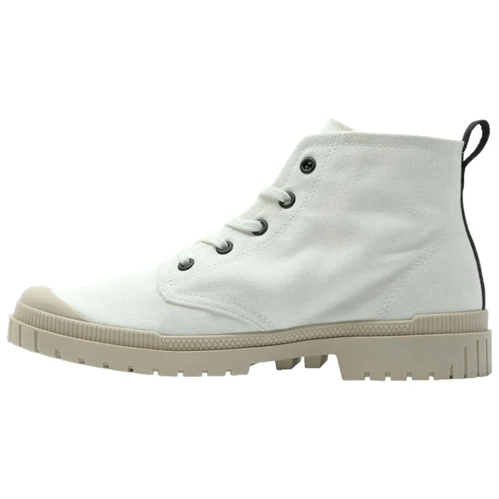 A light-colored high-top shoe with a rounded toe and a textured sole is displayed side-view resting on a flat surface featuring eyelets for laces and a pull tab at the back.