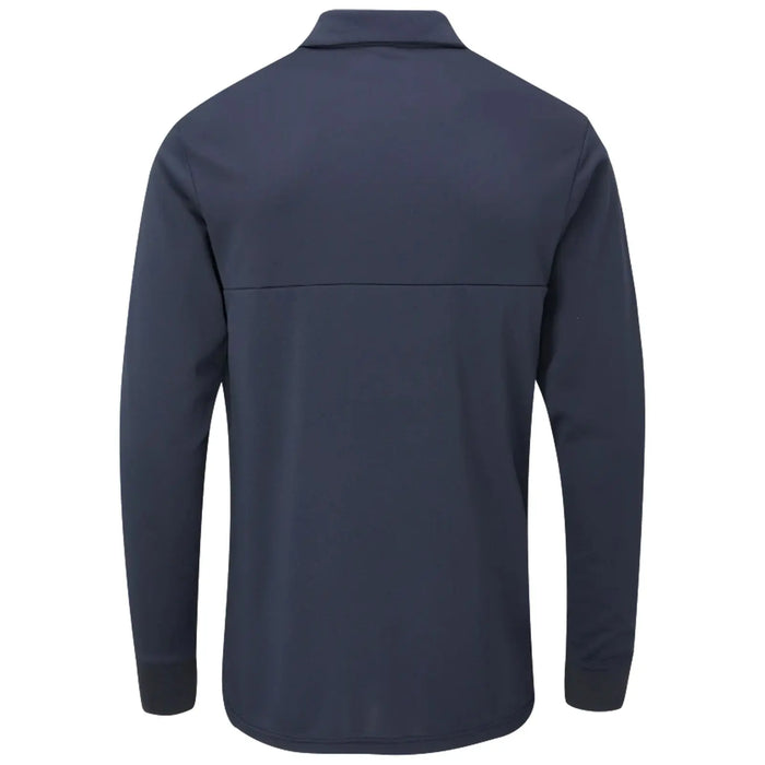 A long-sleeve navy polo shirt is displayed with its back facing the viewer showcasing a simple design and a smooth fabric texture. The shirt has a traditional collar and cuffed sleeves.