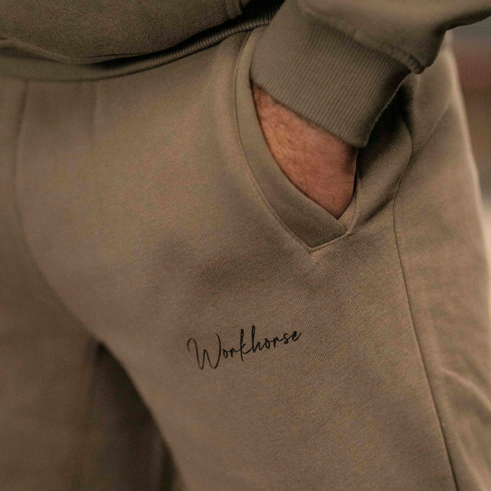Close up of Workhorse Wide Leg Fleece Pants in color brown.