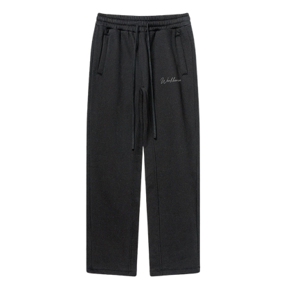 Black pants with a brand logo on a white background